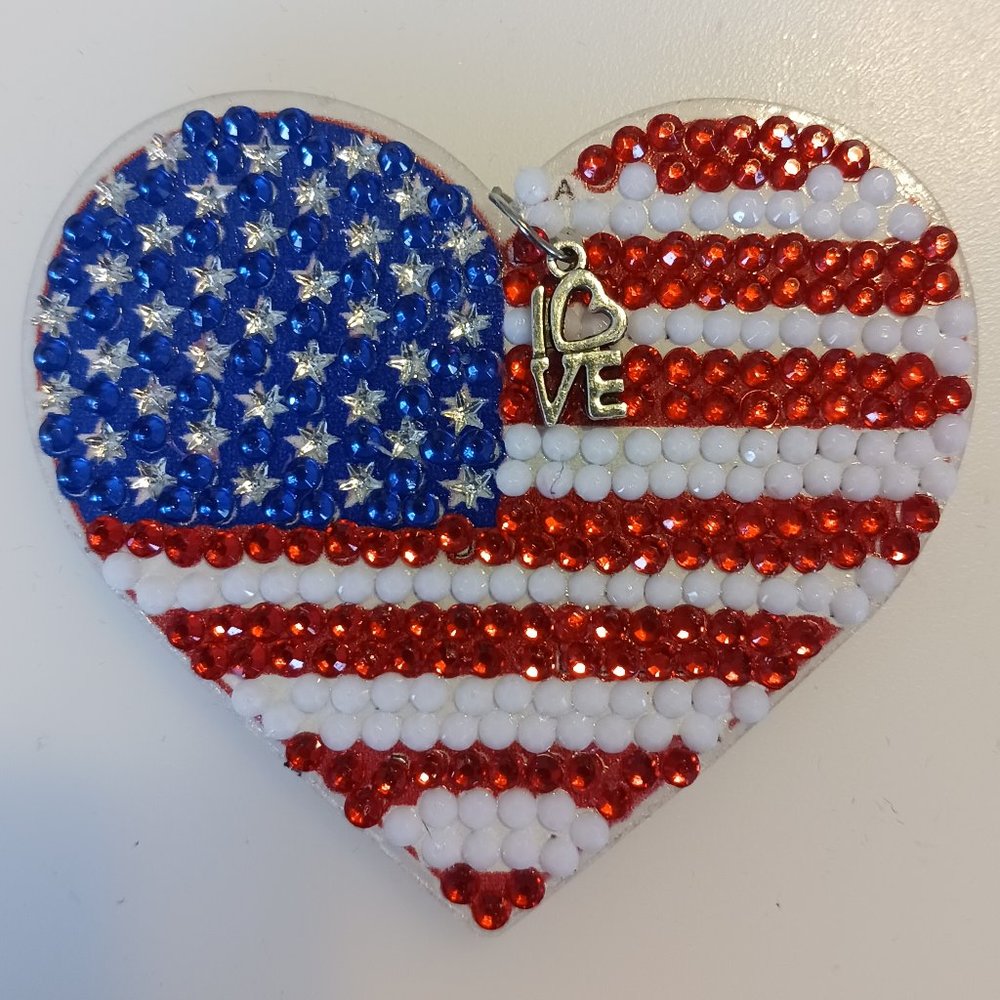 Heart magnet with metal love charm